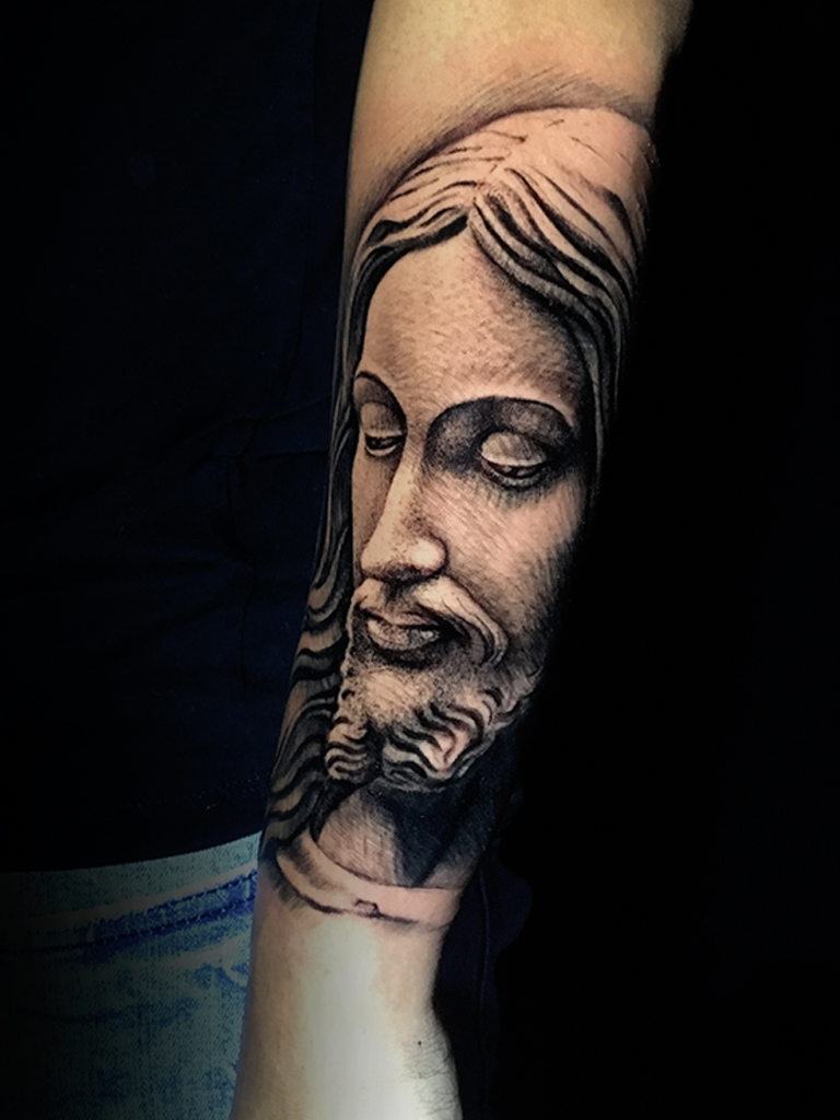 tatuaje de la cara de jesus